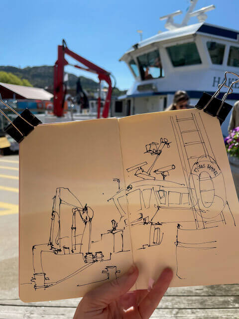 sketching the ferry while waiting for it to leave